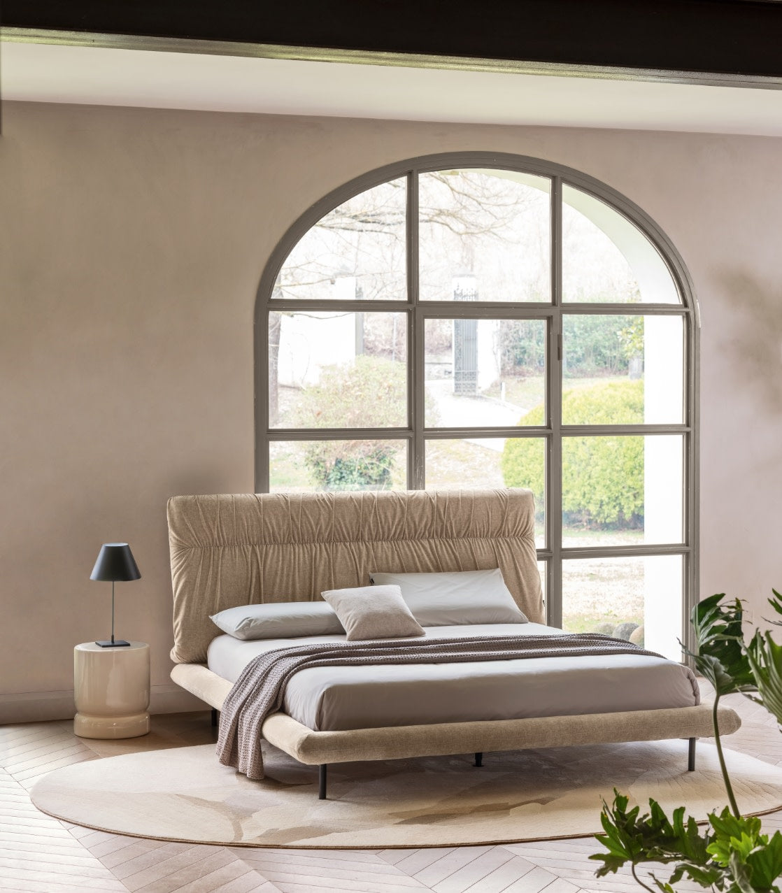 Calligaris Gravity in an interior setting. Upholstery and accessories are illustrative.