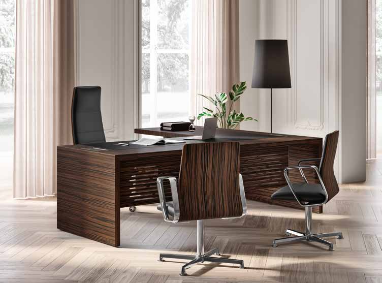 Quadrifoglio e-10 Wood veneer desk with leather insert, RH/LH return unit, supporting cabinet and lacquered legs — manufacturer photograph; dimensions, finishes and return layout follow the selected configuration
