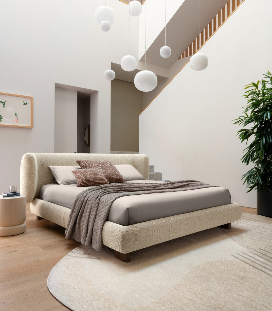 Calligaris Glen bed in an interior. Finish, mattress, bed linen and accessories are illustrative.