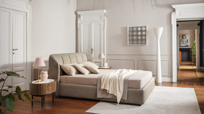 Calligaris Jill bed in an interior. Finish, mattress, bed linen and accessories are illustrative.