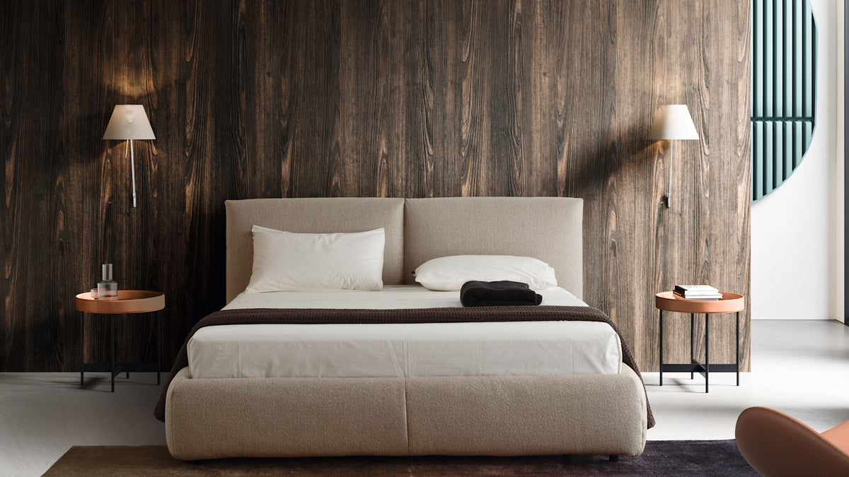 Calligaris Magenta bed in an interior. Finish, mattress, bed linen and accessories are illustrative.