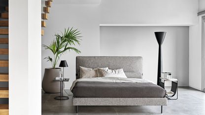 Calligaris Mies bed in an interior. Finish, mattress, bed linen and accessories are illustrative.