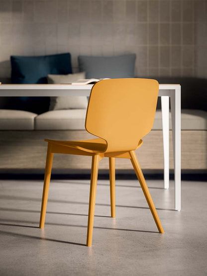 Quadrifoglio Code wooden chair, upholstered seat, sled base in metal