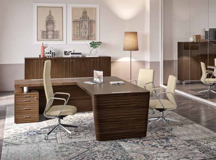 Quadrifoglio X10 Wood veneer desk with RH/LH return unit and supporting pedestal, desktop with leather inlay — original catalogue photograph; selected configuration may vary