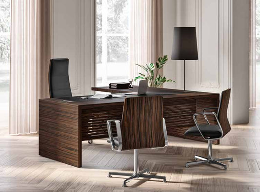 Quadrifoglio e-10 Wood veneer desk with leather insert, RH/LH return unit, supporting cabinet and lacquered legs — manufacturer photograph; dimensions, finishes and return layout follow the selected configuration