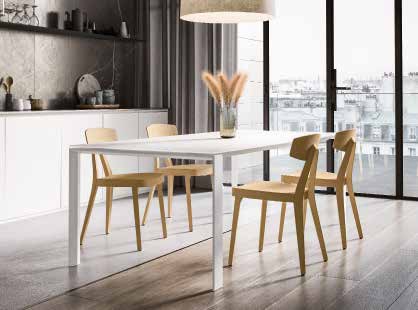 Quadrifoglio Seven Table with melamine top — original manufacturer photograph; selected dimensions and finishes apply