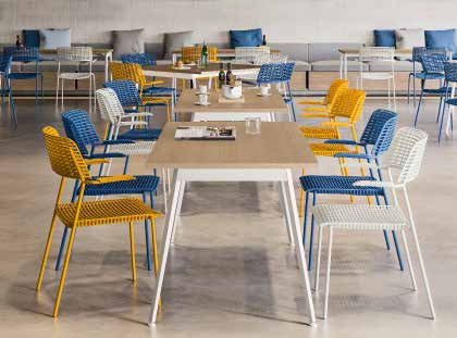 Quadrifoglio Three Table with melamine top — original manufacturer photograph; selected dimensions and finishes apply
